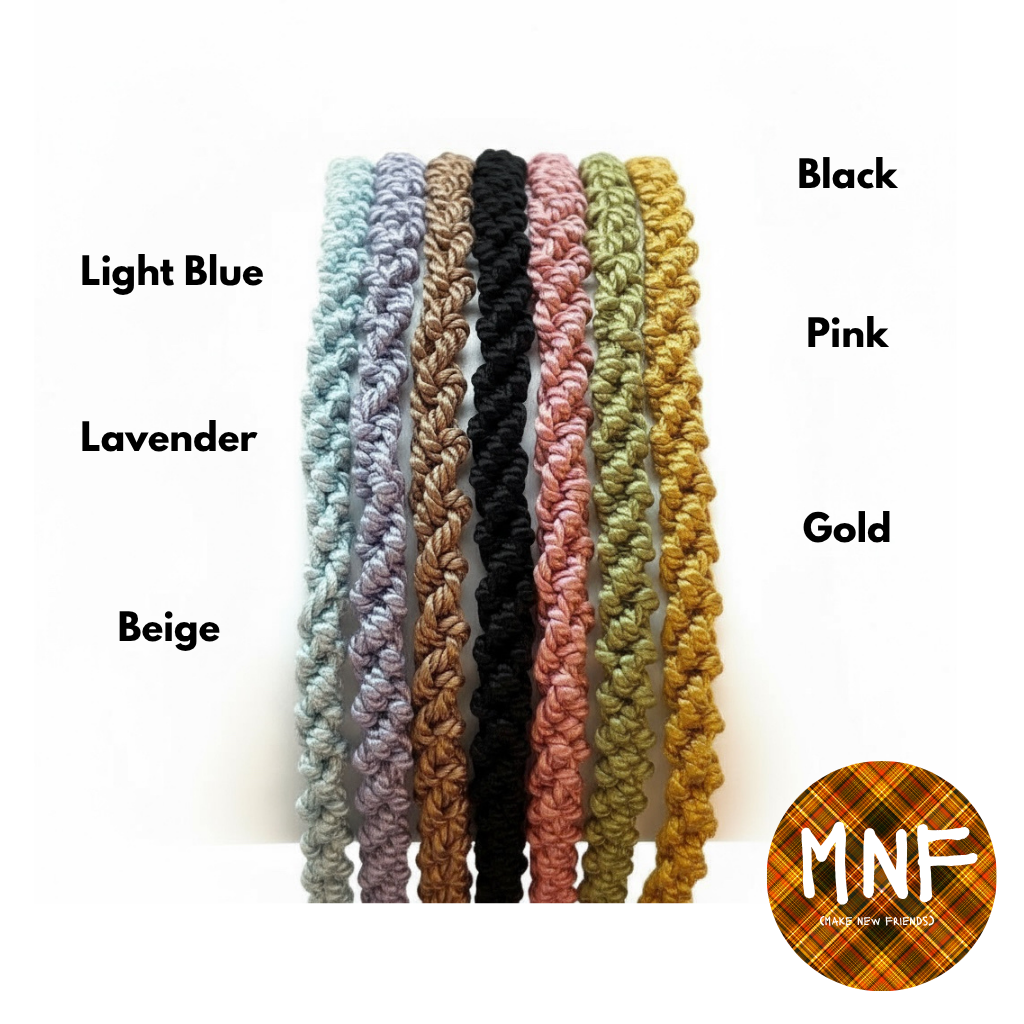 Set of 6 braided friendship bracelets made oh silk in different colors with labels on a white background, featuring the brand 'MNF'.